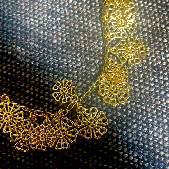 Long goldtone necklace with dangling charms - Picture 2 of 4